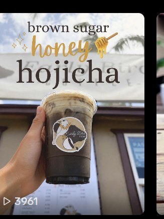 An iced brown sugar honey hojicha in an Early Bird logo cup.